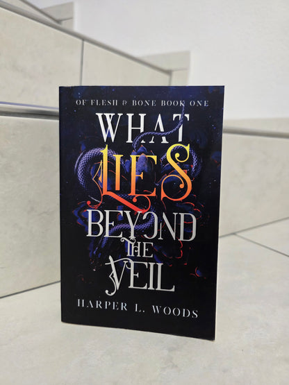 What lies beyond the veil by Harper L. Woods