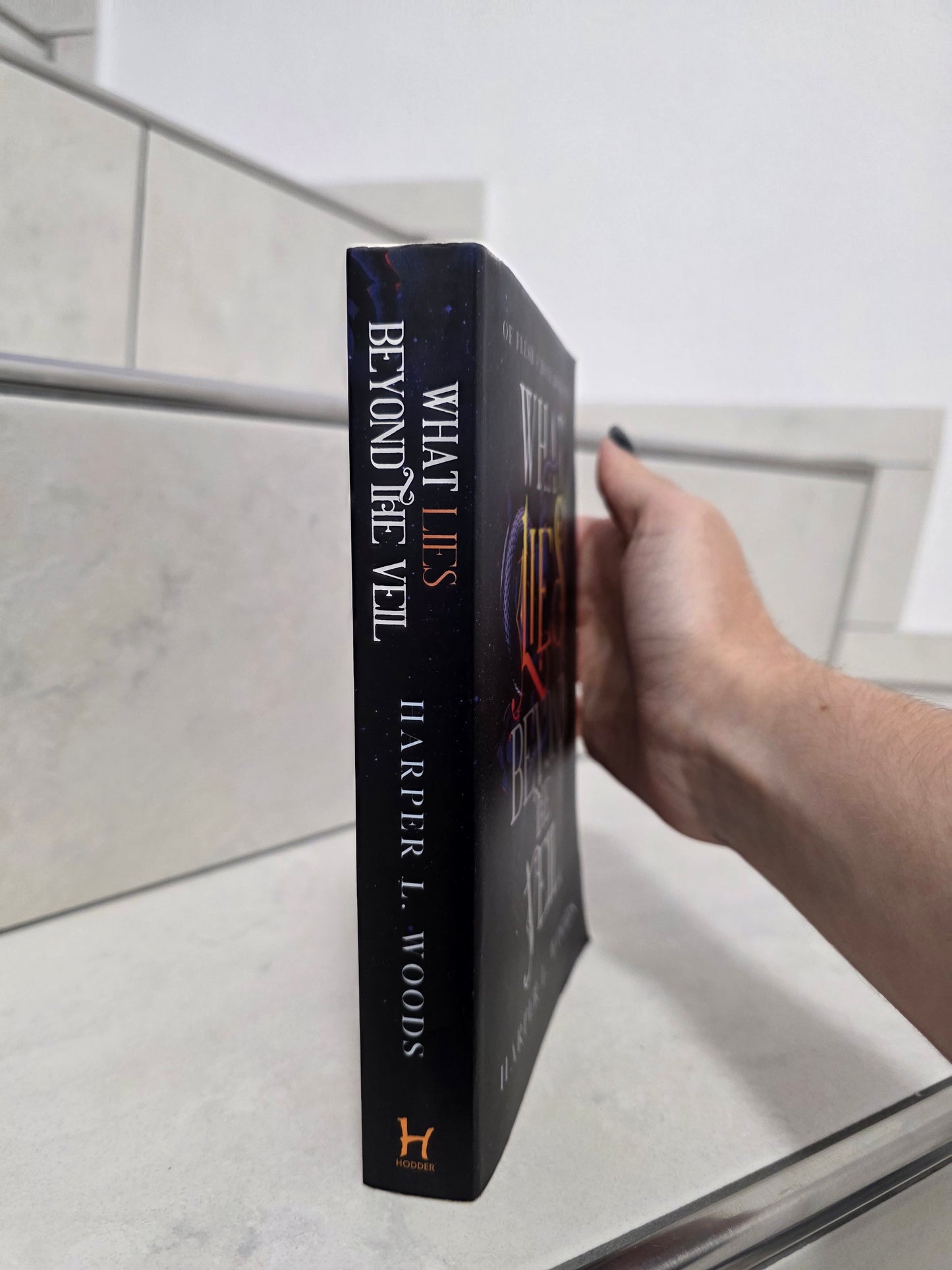 What lies beyond the veil by Harper L. Woods