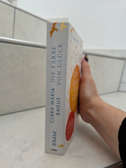 Die Farbe von Glück: Ein Roman über das Ankommen von Clara Maria Bagus