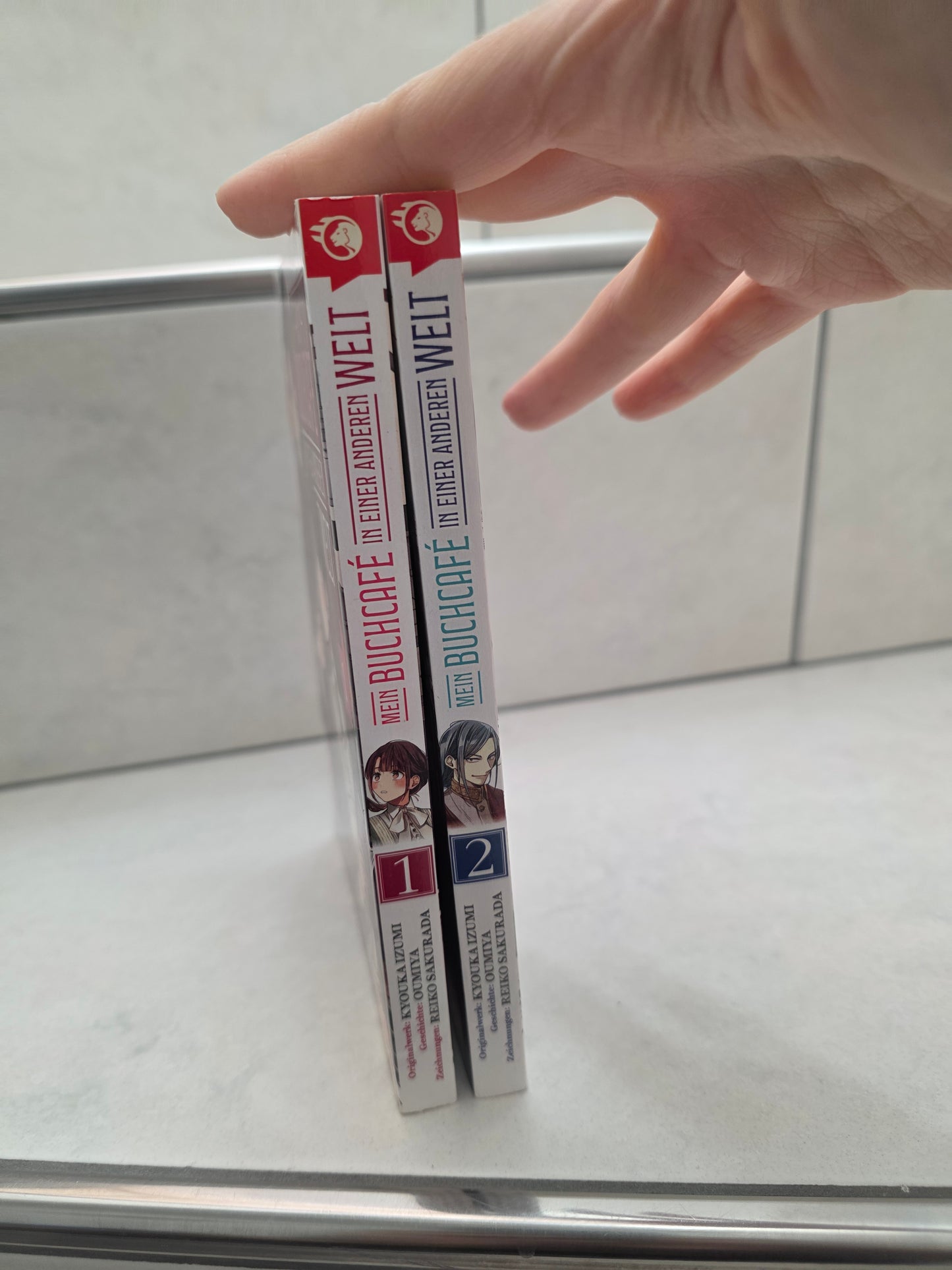 Mein Buchcafé in einer anderen Welt von Kyouka Izumi, Oumiya
