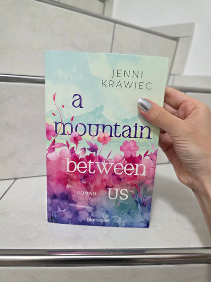 a mountain between us von Jenni Krawiec