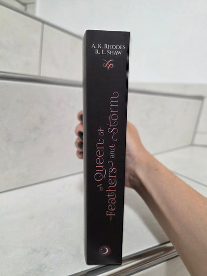 A Queen of Feathers and Storm von Anna K. Rhodes & Robin E. Shaw